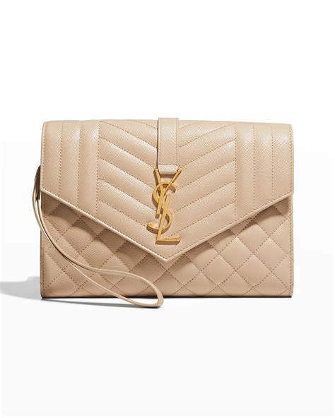 envelope flap ysl clutch bag in grained leather|ysl monogram quilted clutch.